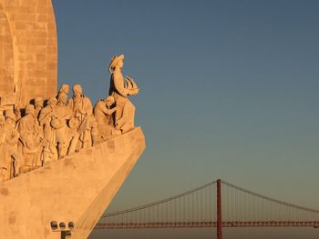 Low angle view of statue against sky