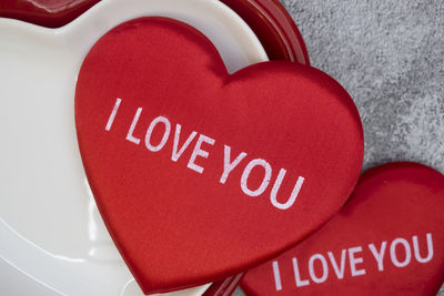 Close-up of text on red heart shape