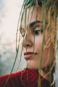 Close-up of young woman looking away