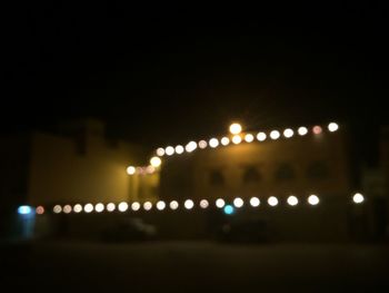 Illuminated street light at night