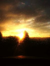 Sunset seen through window
