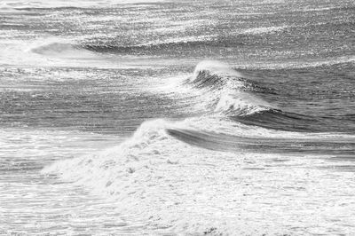 Waves splashing on shore