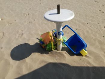 High angle view of toy on beach