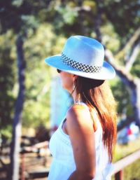 Young woman standing in park