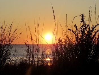 Scenic view of sunset over sea