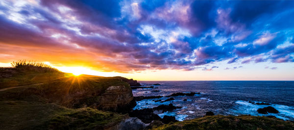 Scenic view of sea against sky during sunset