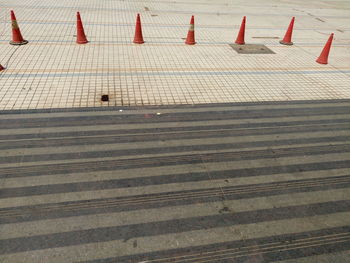 High angle view of traffic cones on pavement
