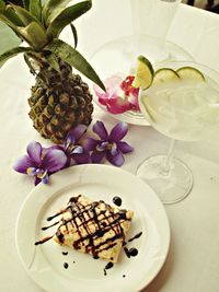 High angle view of dessert with drink served on table