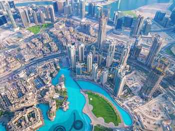 High angle view of swimming pool against buildings in city