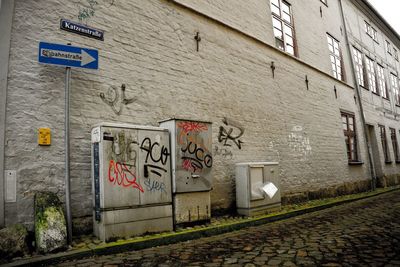 Text on brick wall