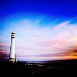 View of lighthouse against blue sky