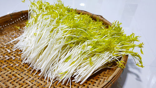 High angle view of vegetables in basket on table