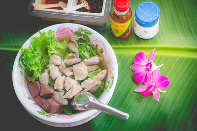 High angle view of pink flowers on table