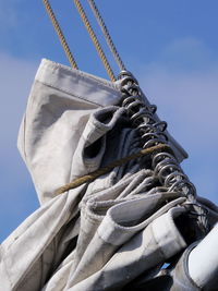 Low angle view of statue against blue sky