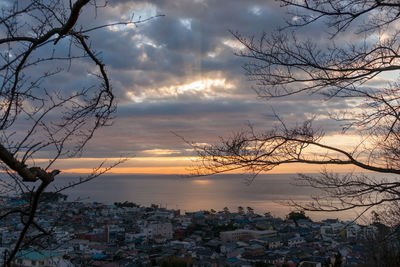 View of buildings against sky at sunset