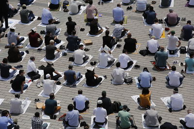 High angle view of people sitting outdoors