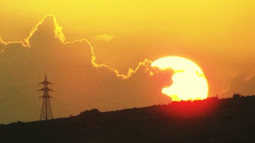 Scenic view of landscape at sunset