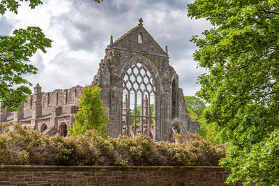 View of holyrood abbey church ruins, edinburgh, scotland. concept of scottish monuments and churches