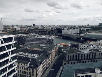 High angle view of buildings in city against sky