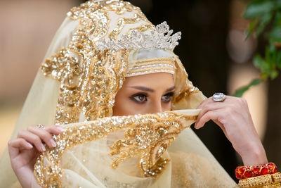 Woman in hijab looking away