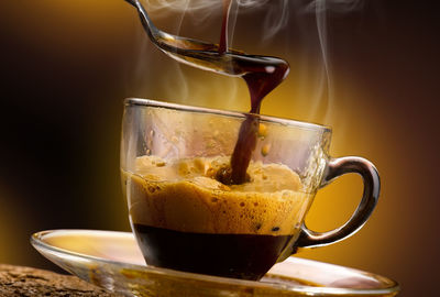 Close-up of coffee cup on table