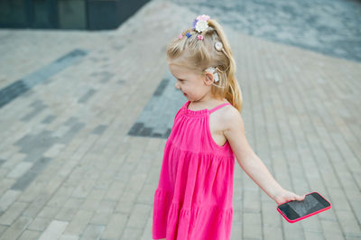 Young woman using mobile phone