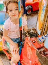 Portrait of cute girl playing at home