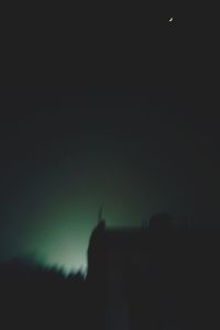 Silhouette of building at night