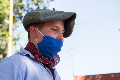 Portrait of young teenager wearing face mask