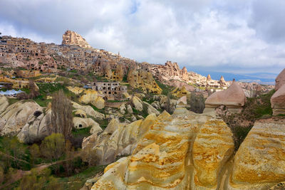 Panoramic view of sea and rock formations against sky