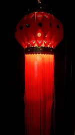 Close-up of lantern over black background