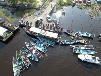 High angle view of boats moored in river