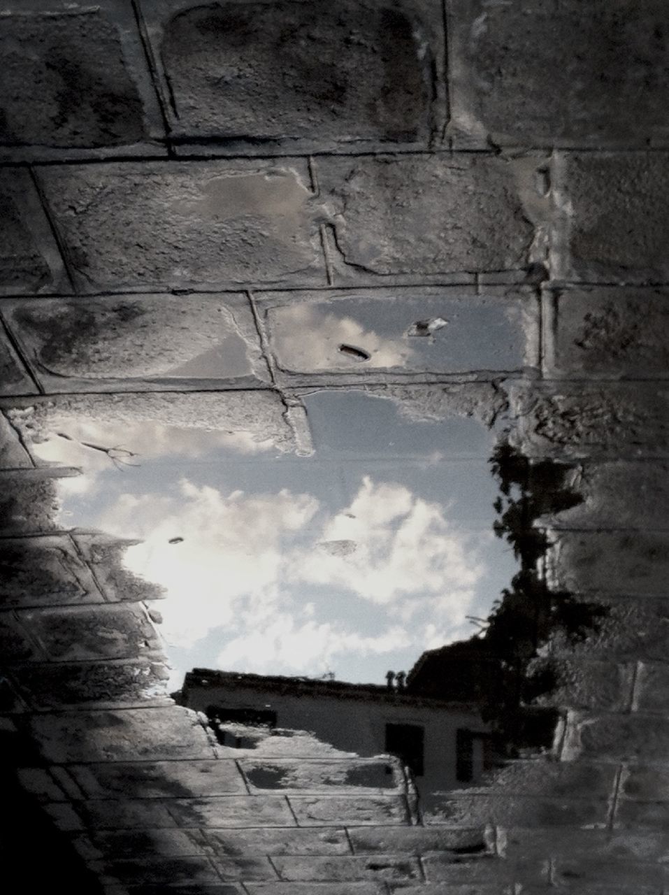 architecture, built structure, building exterior, low angle view, sky, wall - building feature, house, abandoned, building, day, cloud - sky, old, no people, window, damaged, outdoors, brick wall, wall, residential structure, roof
