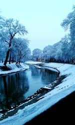 Scenic view of frozen lake against sky