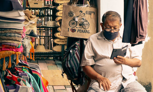  man using mobile phone