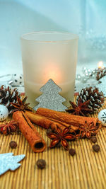 Close-up of candle on table