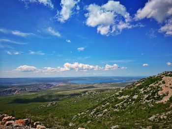 Scenic view of sea against blue sky