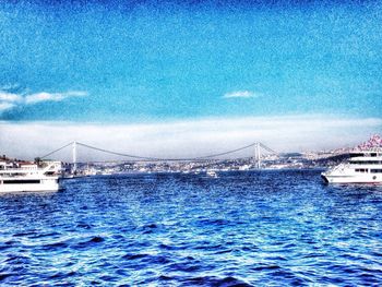 Scenic view of bay against sky