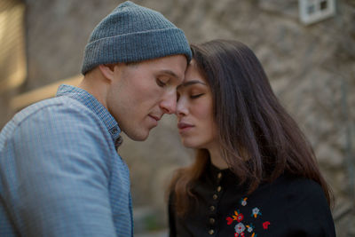 Young couple kissing outdoors