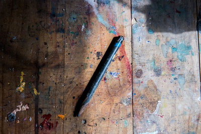 Directly above shot of rusty metal on table