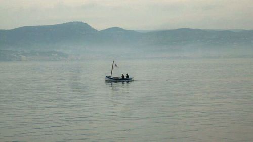 Boats sailing in sea