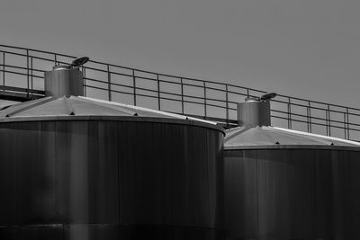 Low angle view of factory against sky