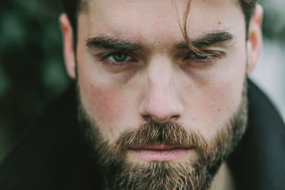 Close-up portrait of mid adult man