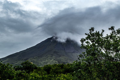 Scenic view of volcanic mountain against sky