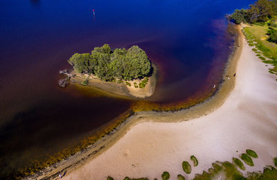 Scenic view of sand dunes against sky