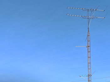 Clear sky and television pole