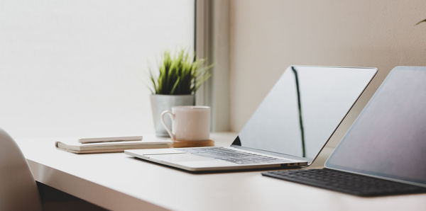 Laptops on table in office