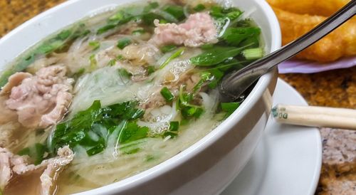 Pho soup in bowl on plate