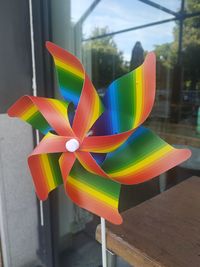 Close-up of multi colored toy on paper