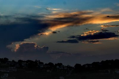 Scenic view of dramatic sky during sunset